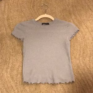 Light blue ruffled Brandy Melville top